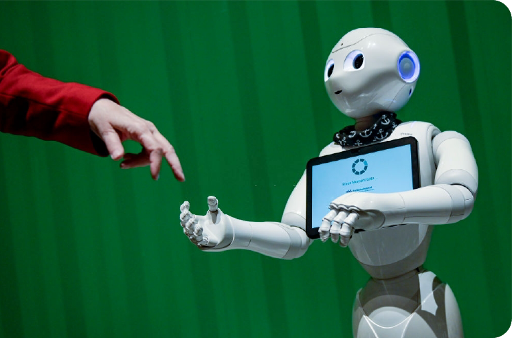 Humanoid service robot handing a tablet to a person